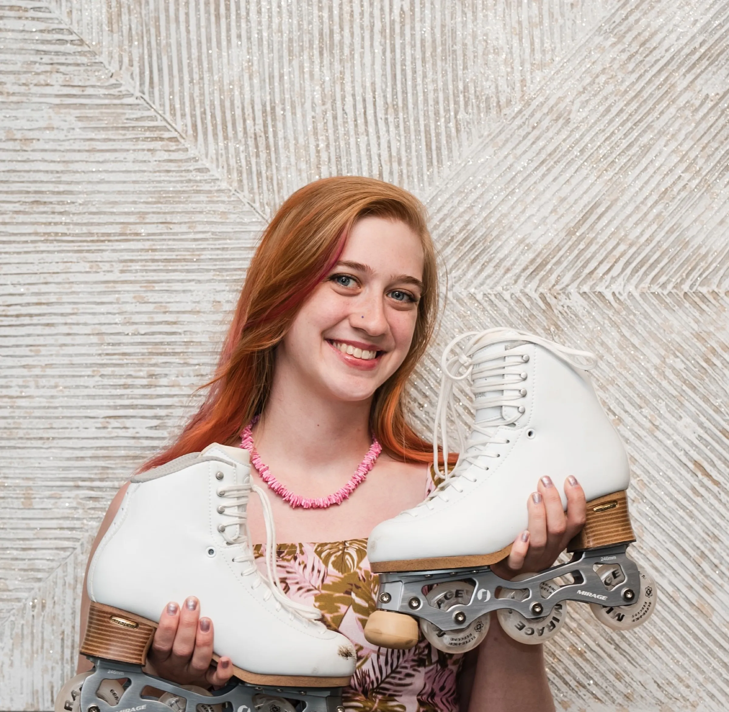 An A&A team member smiling for a fun team portrait